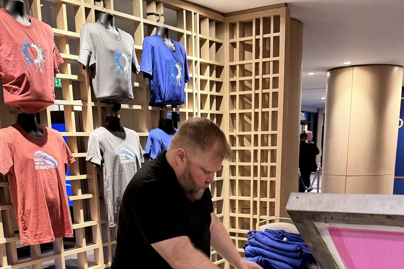 Rack of finished printed shirts on display